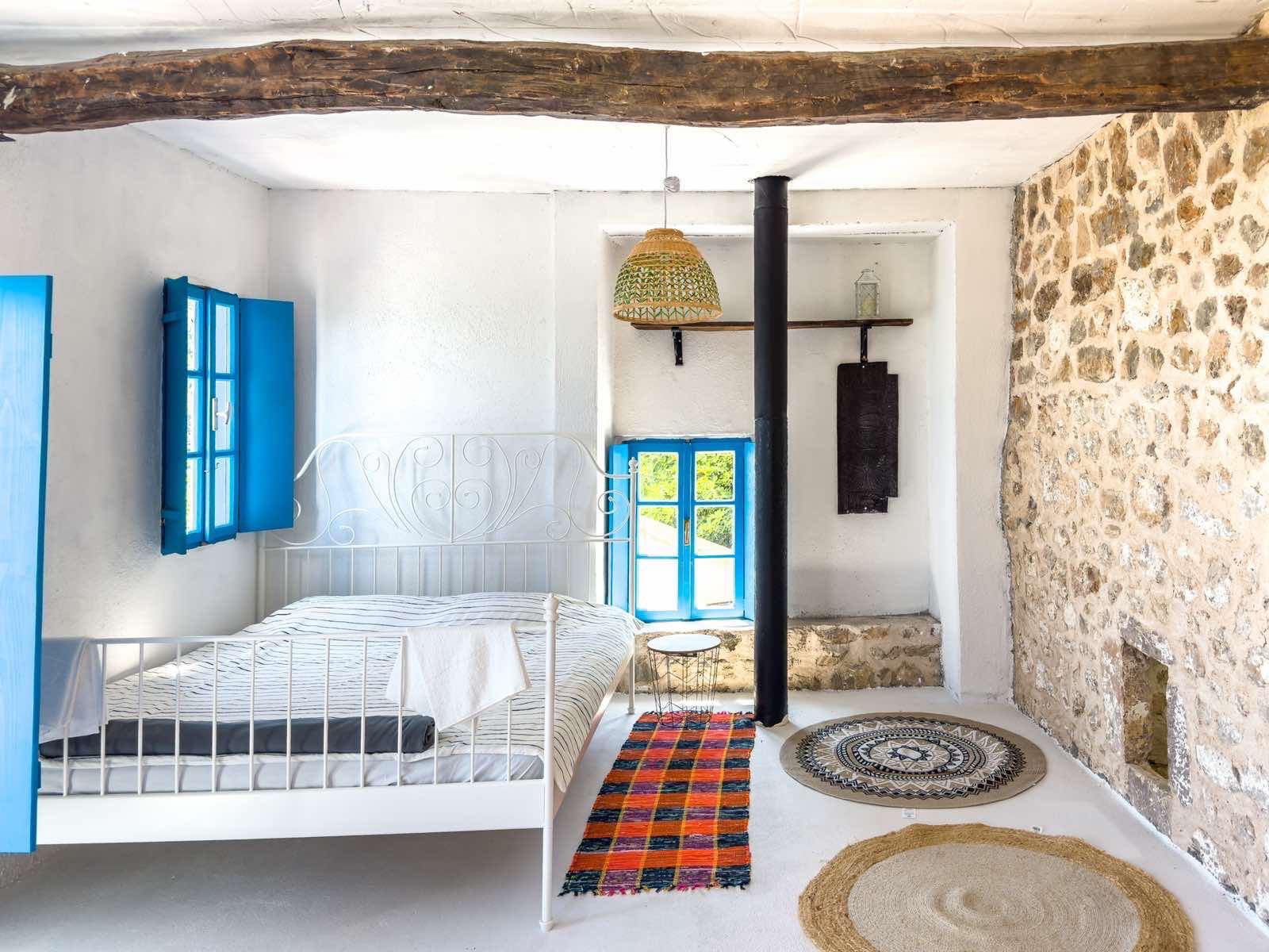 Real Estate Financing Without Banks 12 Real Estate Financing Charming rustic bedroom in Ulcinj, stone accents, sunlit windows & premium finishes—exclusive on montenegro-listings.me by ekosphere doo.
