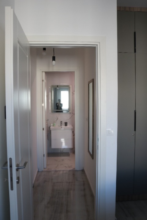 Elegant Ulcinj property: Bright hallway with modern bathroom, quality fixtures, spacious wardrobe. Exclusive on montenegro-listings.me by ekosphere doo.