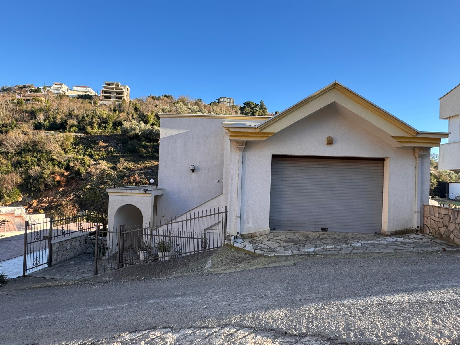 Charming single-story Ulcinj home with garage, gated entry, garden, scenic hill views&mdash;exclusive on montenegro-listings.me by ekosphere doo.