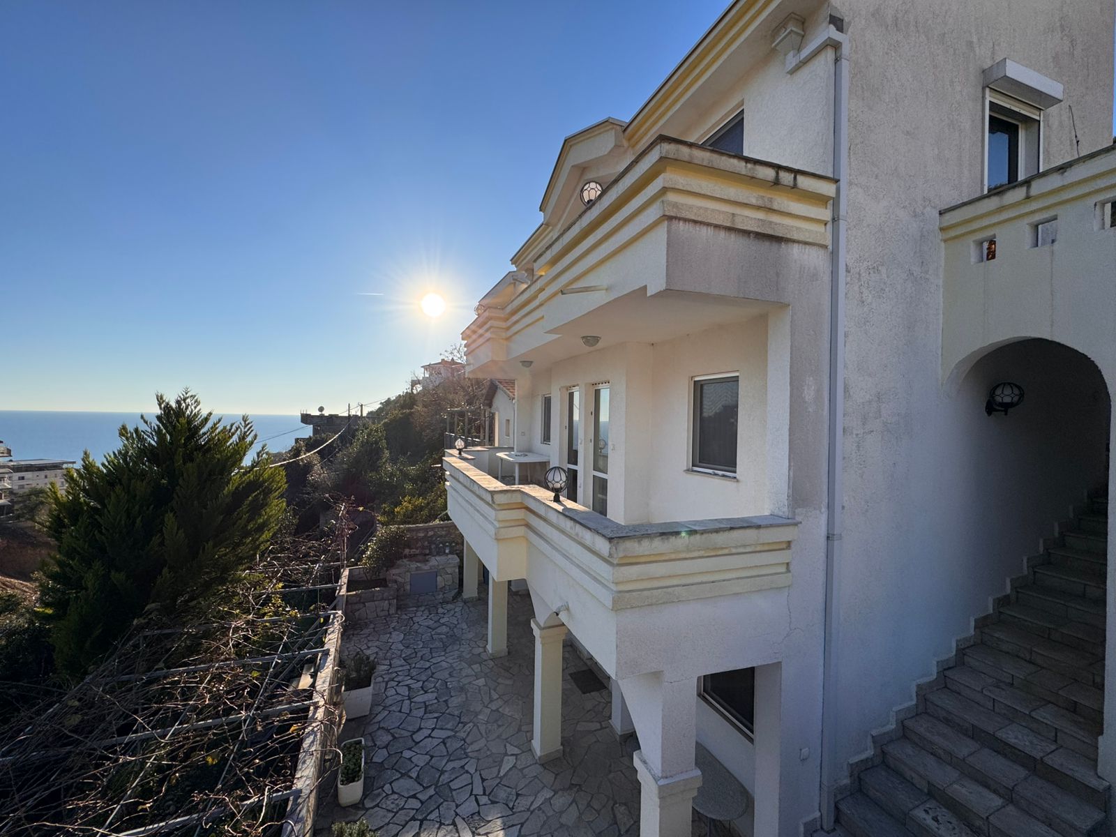 Elegant two-story white villa in Ulcinj with sea views, balconies, stone patio&mdash;prime investment via montenegro-listings.me by ekosphere doo.