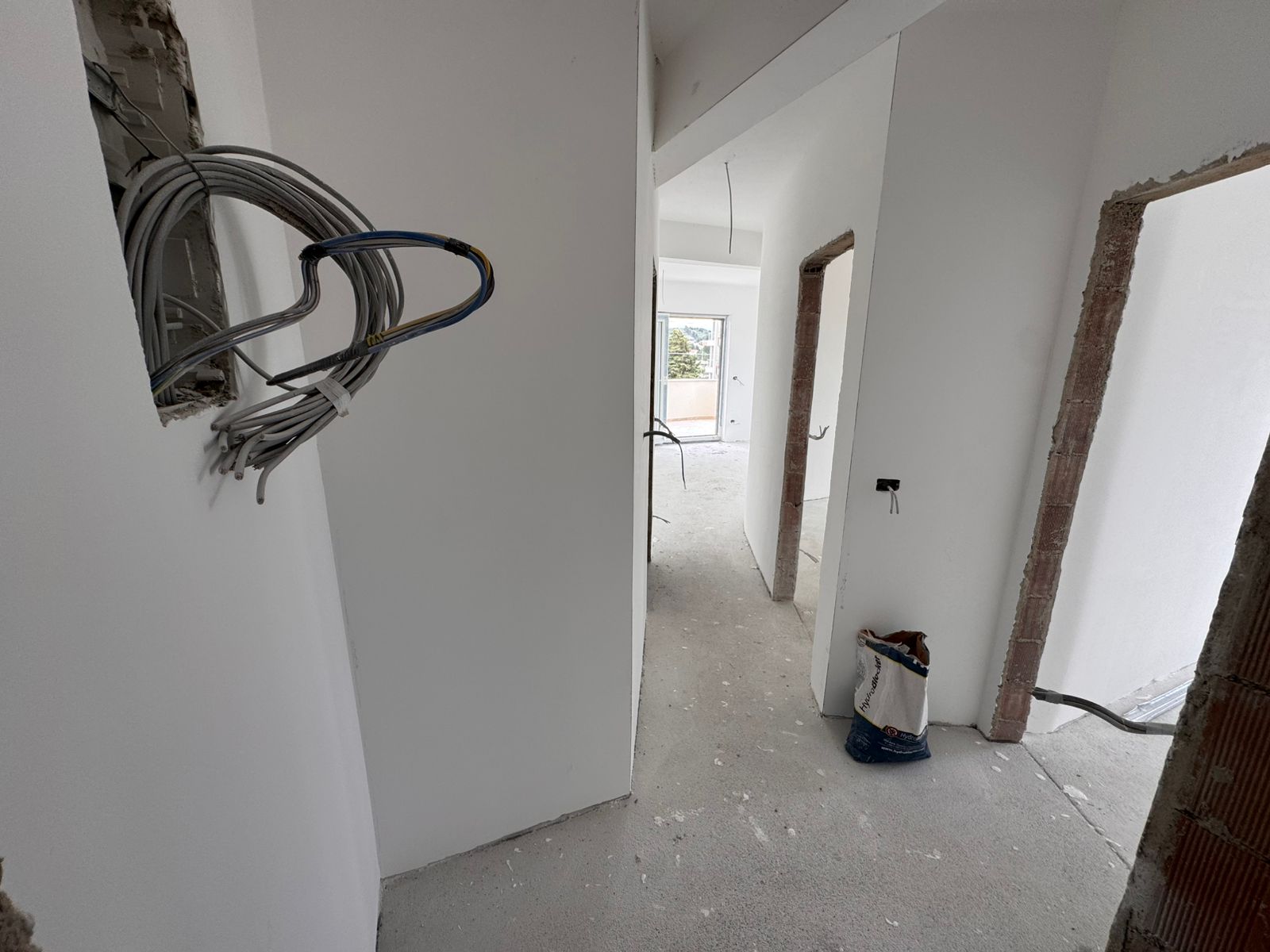 Bright hallway in a prime Ulcinj, Montenegro property; unfinished build&mdash;ideal real estate investment. On montenegro-listings.me by ekosphere doo.