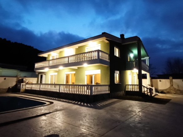 Stunning two-story villa in Ulcinj, Montenegro with pool, balconies, and modern patio—exclusive on montenegro-listings.me by ekosphere doo.