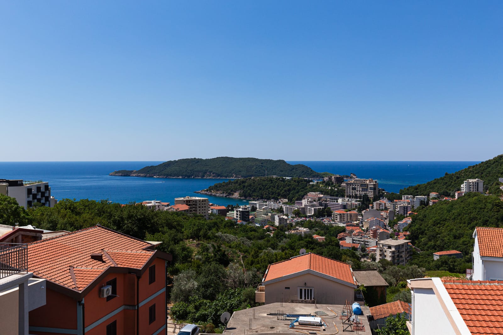 Premium Ulcinj real estate: red-roofed homes, lush hills, and Adriatic views&mdash;exclusive from montenegro-listings.me by ekosphere doo.