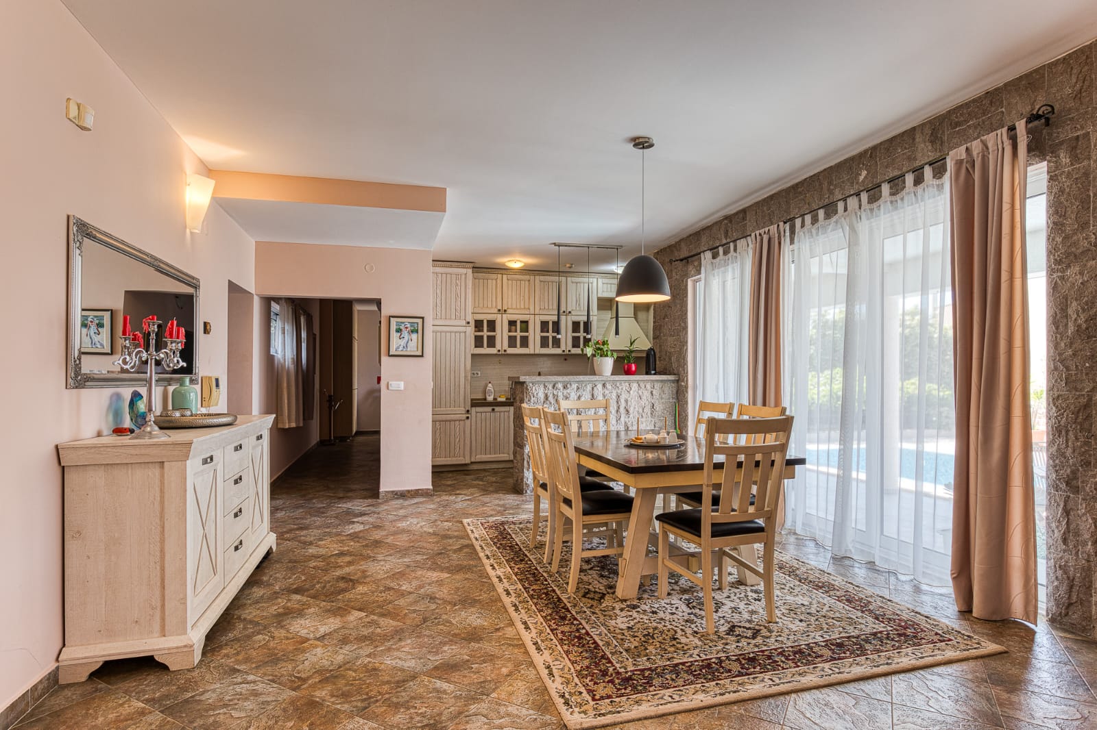 Elegant Ulcinj apartment: spacious dining area, modern kitchen, premium finishes&mdash;ideal Montenegro investment. By ekosphere doo.