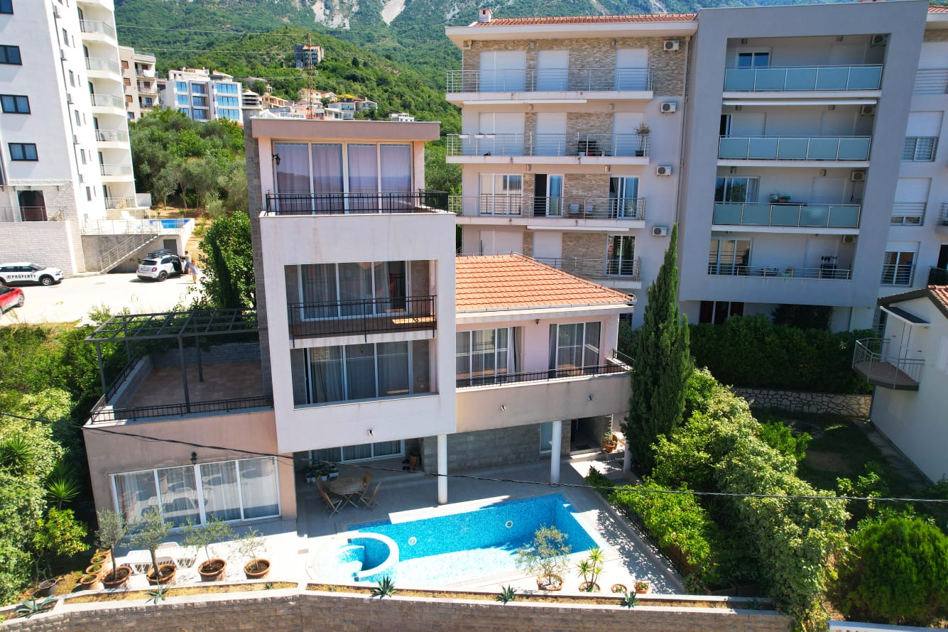 Stunning modern two-story home in Ulcinj, Montenegro with pool, stone patio, mountain views&mdash;exclusive on montenegro-listings.me by ekosphere doo.