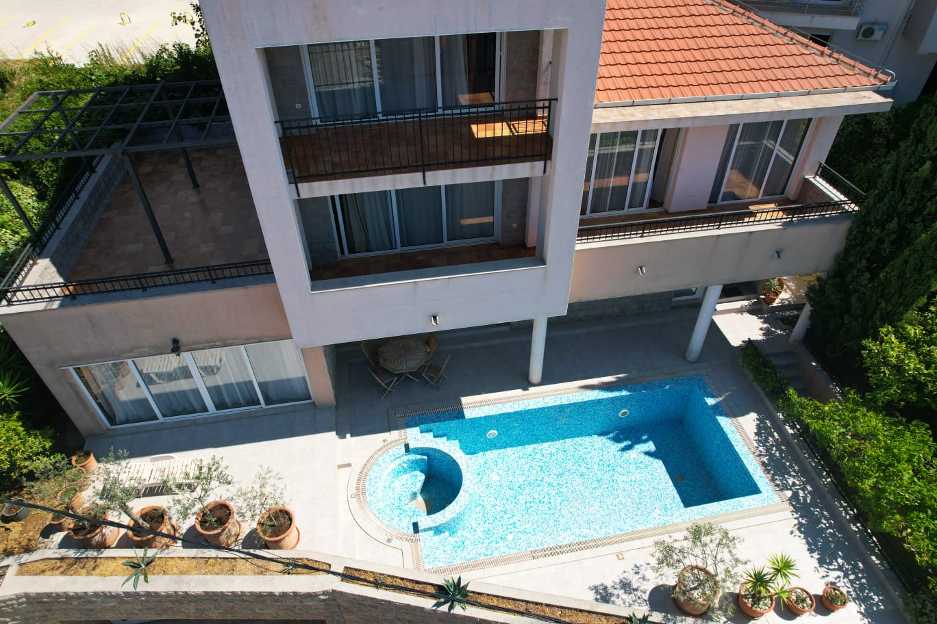 Stunning modern home in Ulcinj, Montenegro: tiled roof, large windows, balcony, pool & patio. Exclusive on montenegro-listings.me by ekosphere doo.