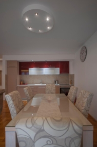 Experience contemporary living in Ulcinj with this stylish kitchen, dining area, upscale finishes—an exclusive ekosphere doo listing.