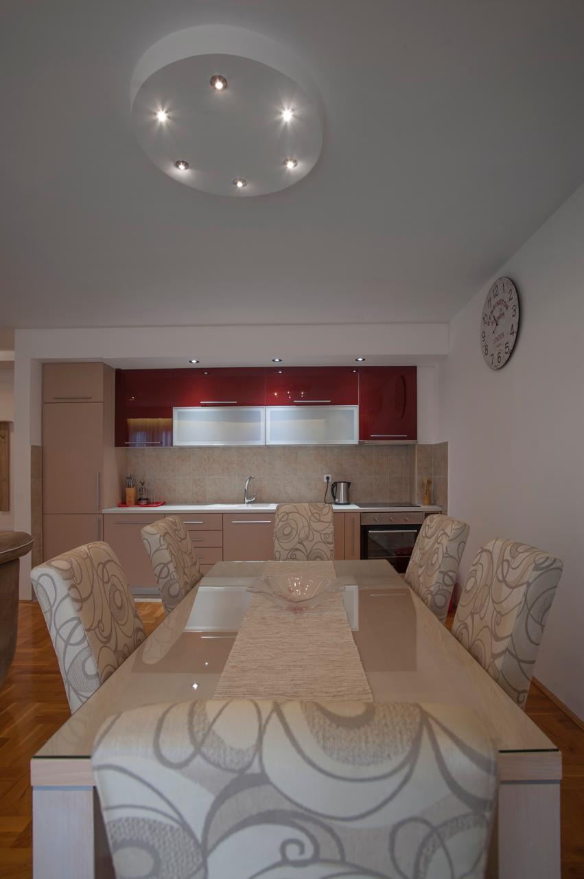 Experience contemporary living in Ulcinj with this stylish kitchen, dining area, upscale finishes—an exclusive ekosphere doo listing.