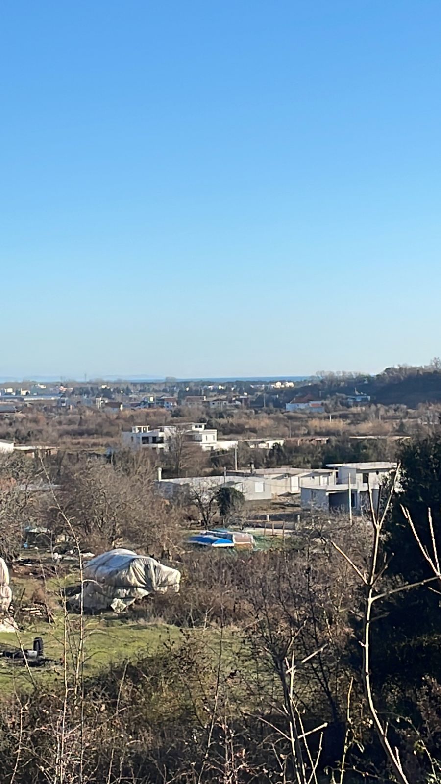 Discover investment potential in Ulcinj, Montenegro: scenic rural land, scattered homes, and open skies—exclusive at montenegro-listings.me by ekosphere doo.