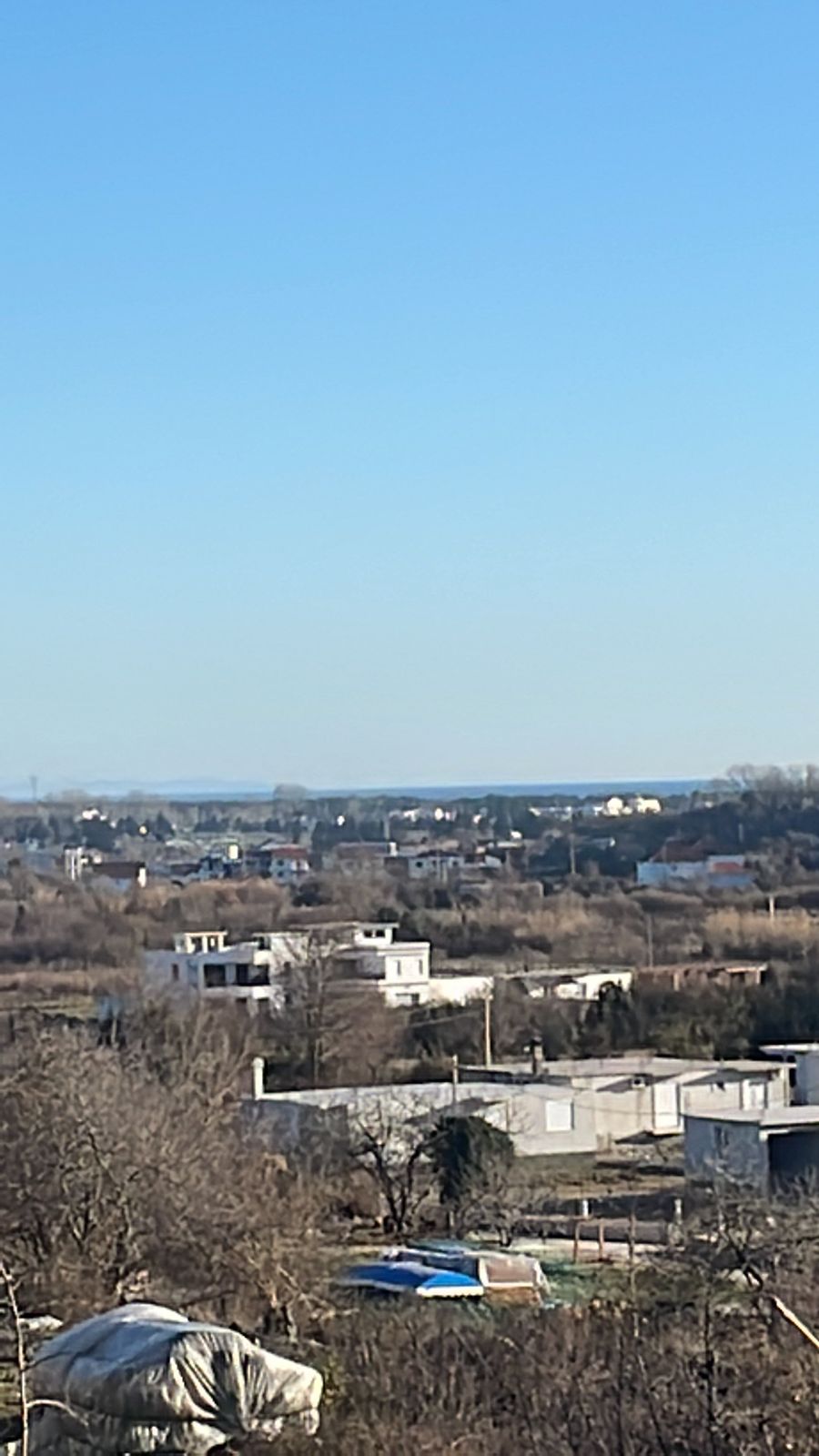 Stunning Ulcinj rural property views—investment potential with scattered houses, open landscapes, and development opportunity. Montenegro-listings.me by ekosphere doo.