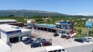 Prime Ulcinj commercial property: auto service center with modern facilities, ample parking, scenic hills—exclusive on montenegro-listings.me.