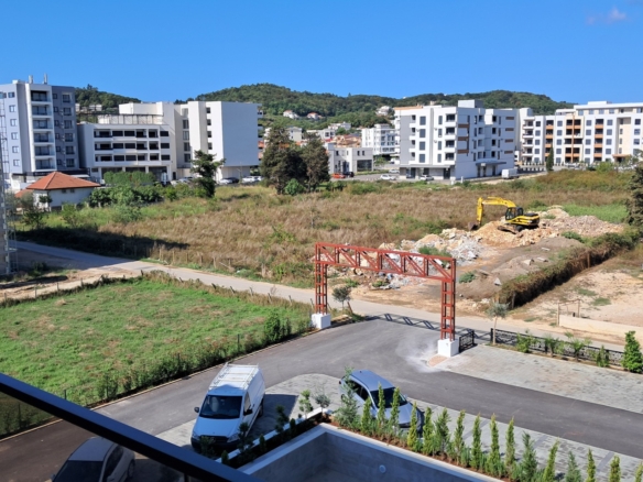 Prime Ulcinj property: New apartments rising amid hills, modern builds, and clear skies. Montenegro-listings.me by ekosphere doo.