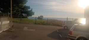 Prime Ulcinj property: sunny sea views, fenced parking, lush lawn. Exclusive at montenegro-listings.me by ekosphere doo.