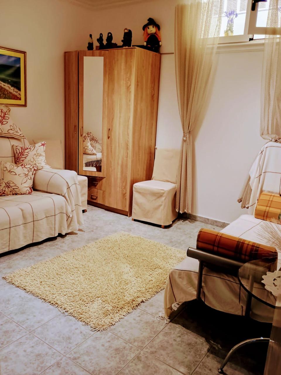 Bright, stylish Ulcinj living room with tile floors, beige sofas, and modern furnishings—prime investment on montenegro-listings.me. Bright, stylish Ulcinj living room with tile floors, beige sofas, and modern furnishings—prime investment on montenegro-listings.me.