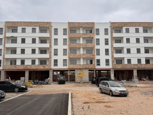 Experience premium Ulcinj real estate investment: modern 4-story apartment building, prime location, exclusive at montenegro-listings.me.