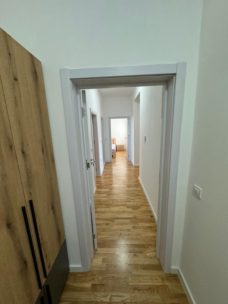 Elegant Ulcinj apartment hallway with quality wood floors, bright interiors, and spacious rooms&mdash;exclusive on montenegro-listings.me by ekosphere doo.