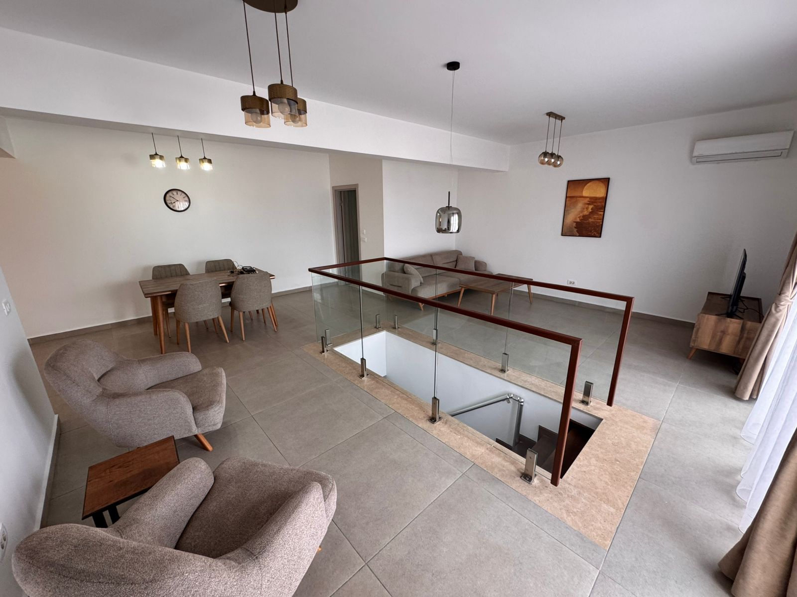 Elegant open-plan living and dining space in Ulcinj with premium finishes, perfect for investment&mdash;listed on montenegro-listings.me by ekosphere doo.