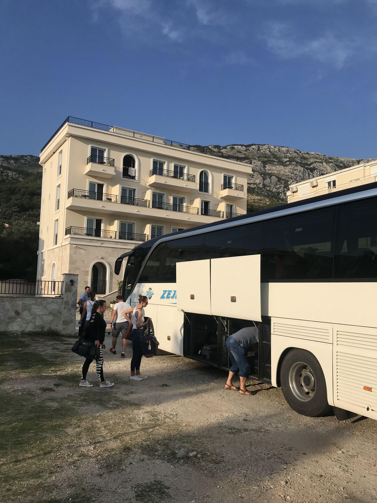 Modern three-story beige building with balconies in Ulcinj, prime location for investment. Featured on montenegro-listings.me by ekosphere doo.
