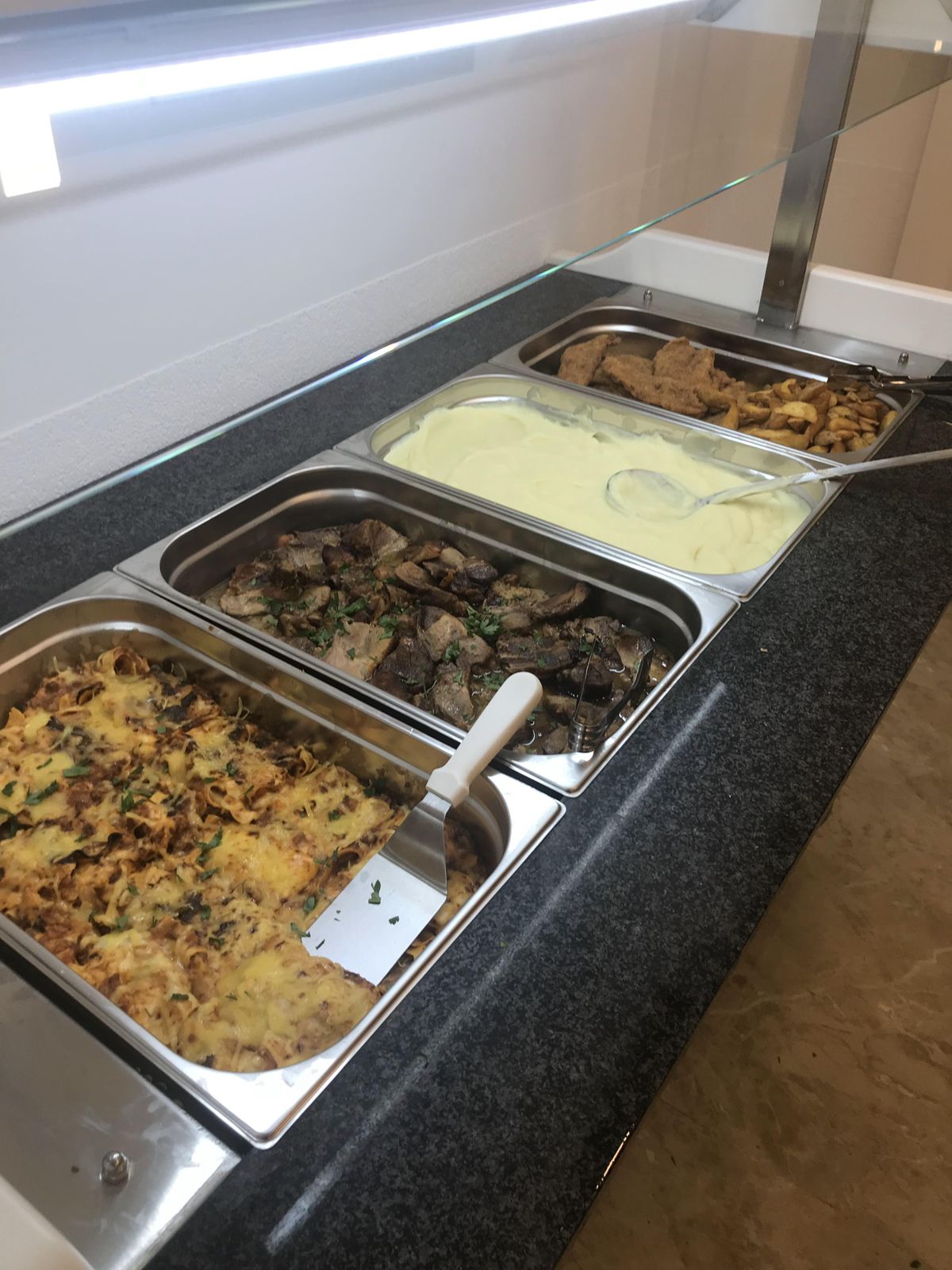 Modern buffet counter in Ulcinj, ideal for luxury Montenegro real estate&mdash;investment-ready via montenegro-listings.me by ekosphere doo.