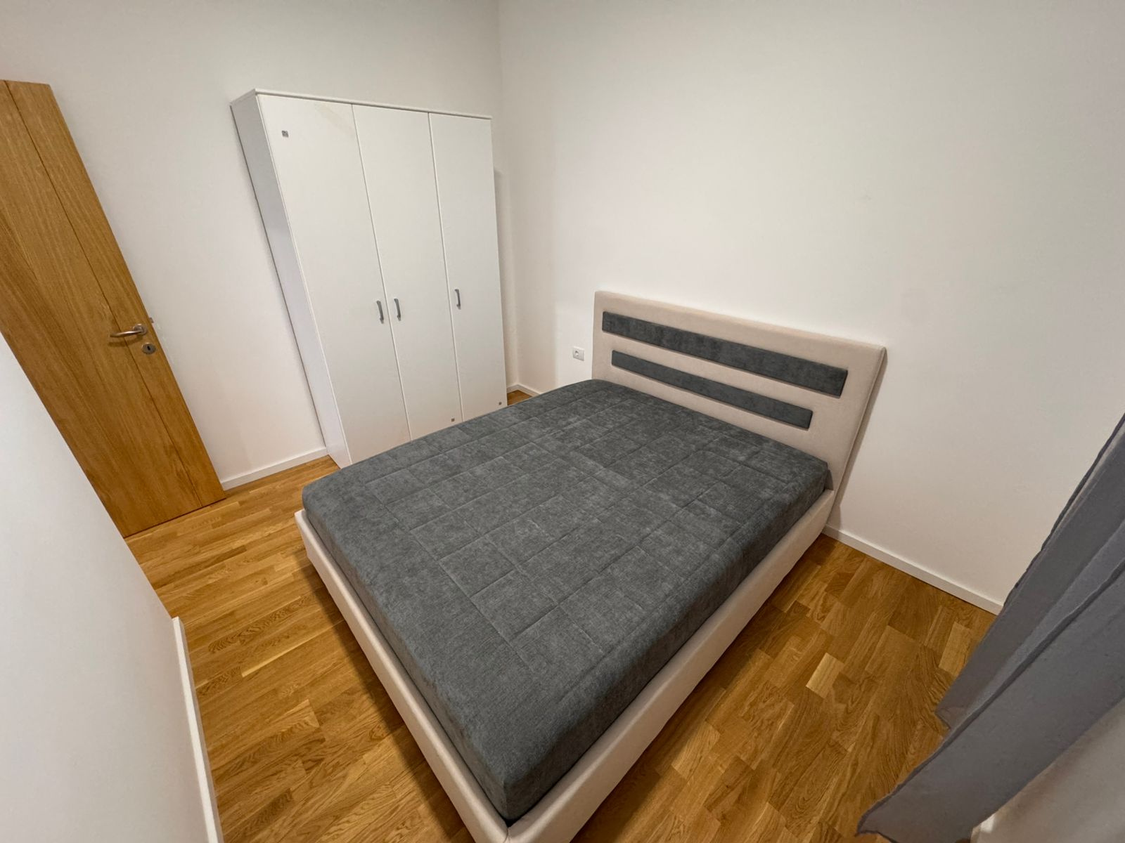Modern bedroom in Ulcinj, Montenegro&mdash;double bed, stylish finishes, great investment. Listed by montenegro-listings.me, ekosphere doo.