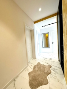 Stunning Ulcinj hallway with marble floors, modern finishes, and elegant accents—exclusive property by ekosphere doo at montenegro-listings.me.