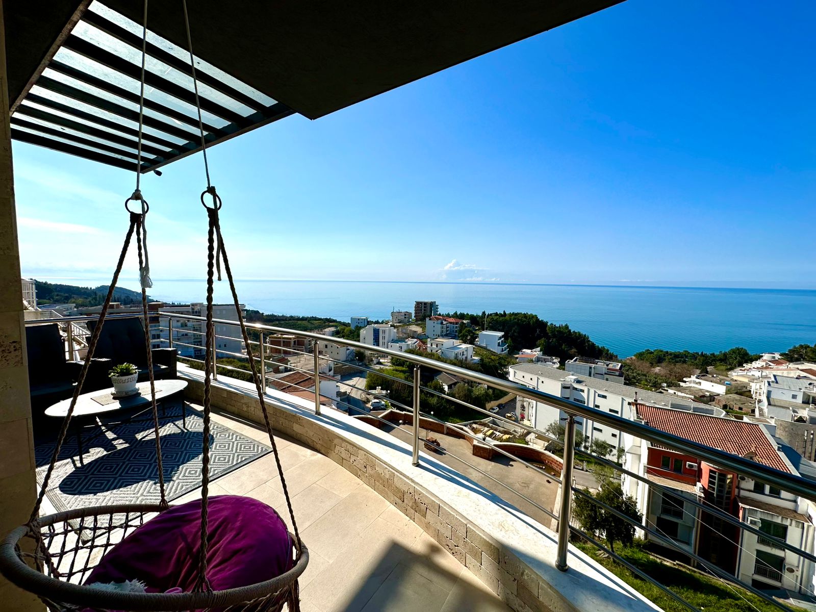 Luxurious Ulcinj balcony with sea views, modern design, and relaxing spaces&mdash;prime Montenegro real estate by montenegro-listings.me.
